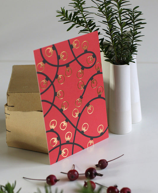 kultafolioitu postikortti, valot