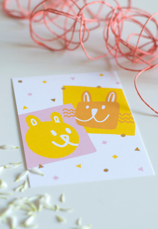 Kaverit postcard on a table