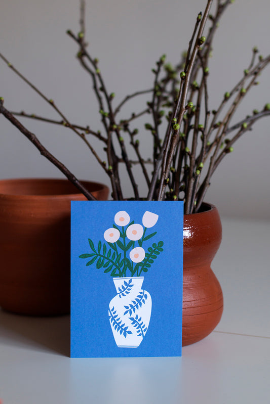 Kukkamaljakko postcard and a vase
