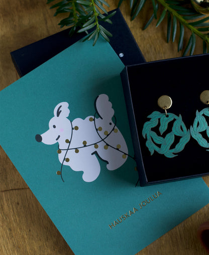 Iloinen joulukoira postikortti