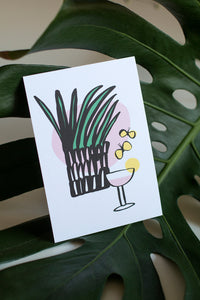 Drinkki postcard and a monstera leaf