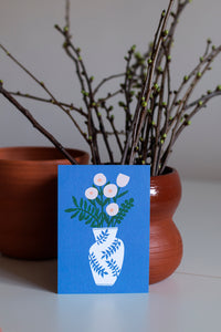 Kukkamaljakko postcard and a vase